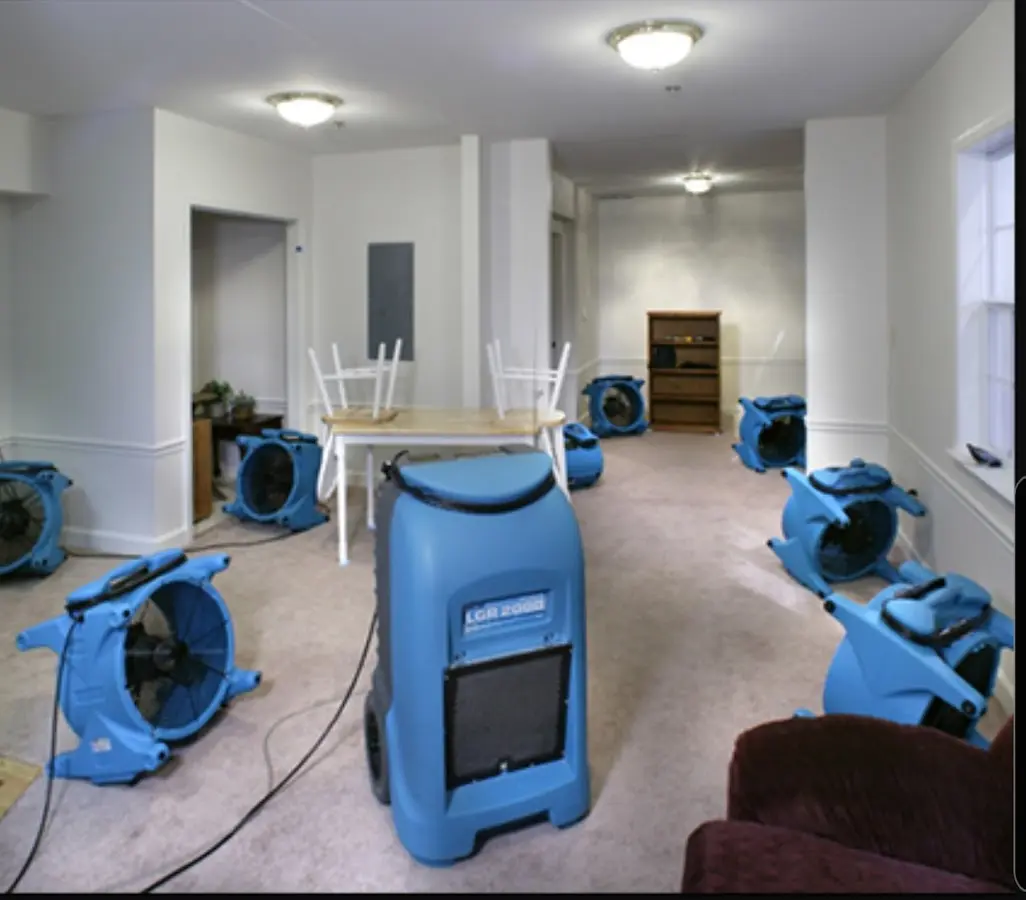 Air movers and dehumidifier setup for Water Damage Restoration in Brunswick